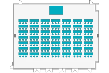 宴会場「光」のスクール形式レイアウト図。長机がすべて正面に向かって縦横に整然と並び、正面中央に長方形のテーブルが置かれている。